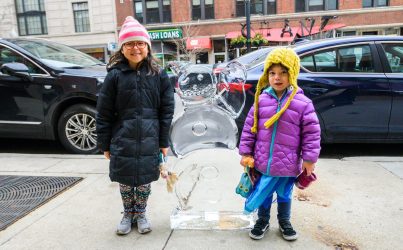 kids with ice sculpture